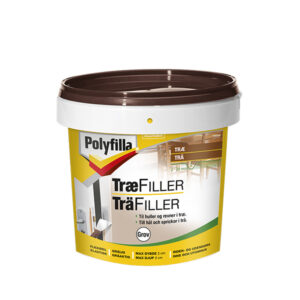 Plastikspand mærket "Polyfilla TræFiller" med brun låg. Anvendes til huller og revner i træ, dybde op til 2 cm. Inden- og udendørs brug. Tekst på dansk og svensk.
