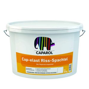 En hvid plastikspand med låg indeholder "Caparol Cap-elast Riss-Spachtel". Et billede af en elefant med farvede striber pryder etiketten. Spanden er på 10 kg og bruges til reparation.